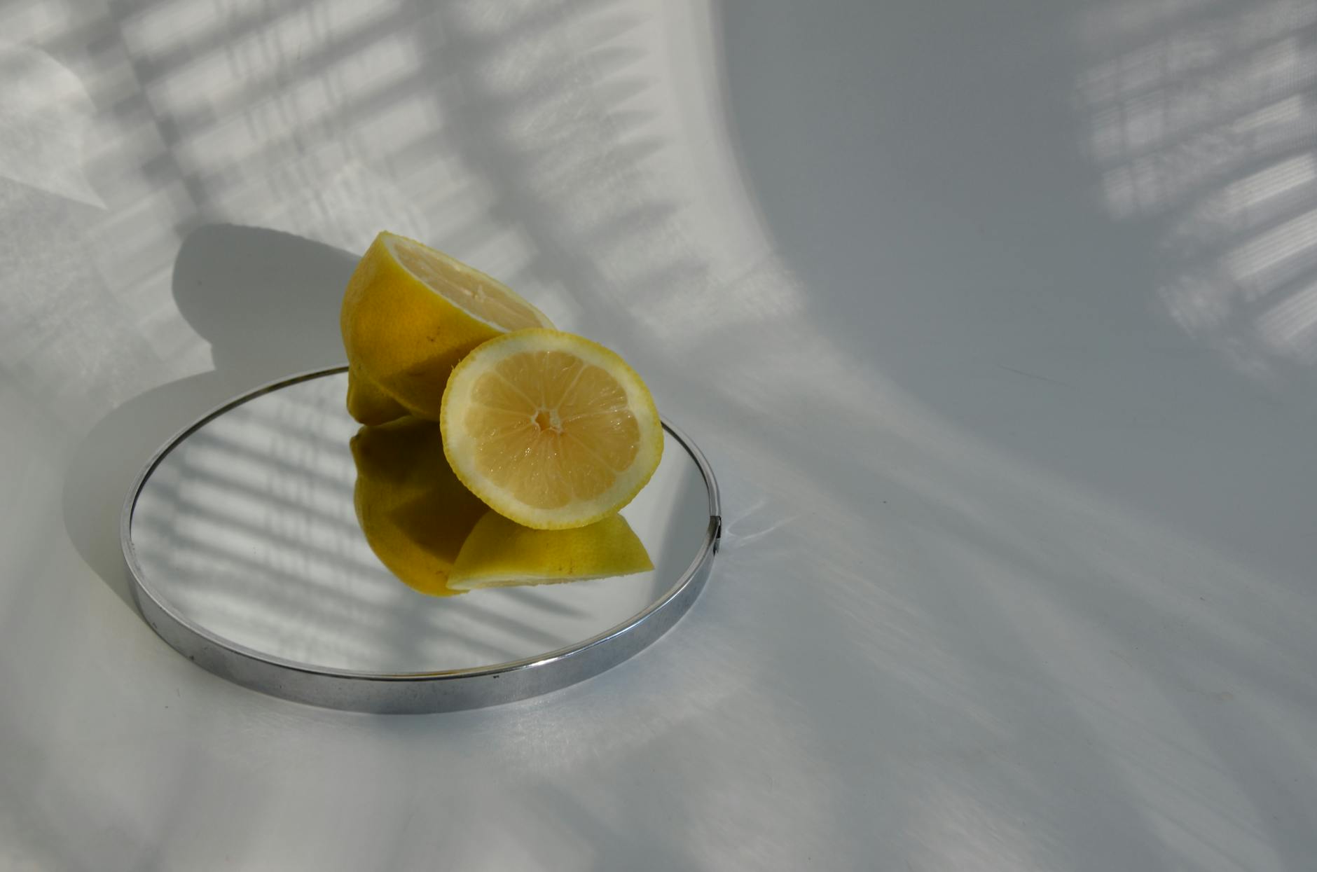 Two women expressing joy with lemon slices, representing comfort and pleasure across different body states